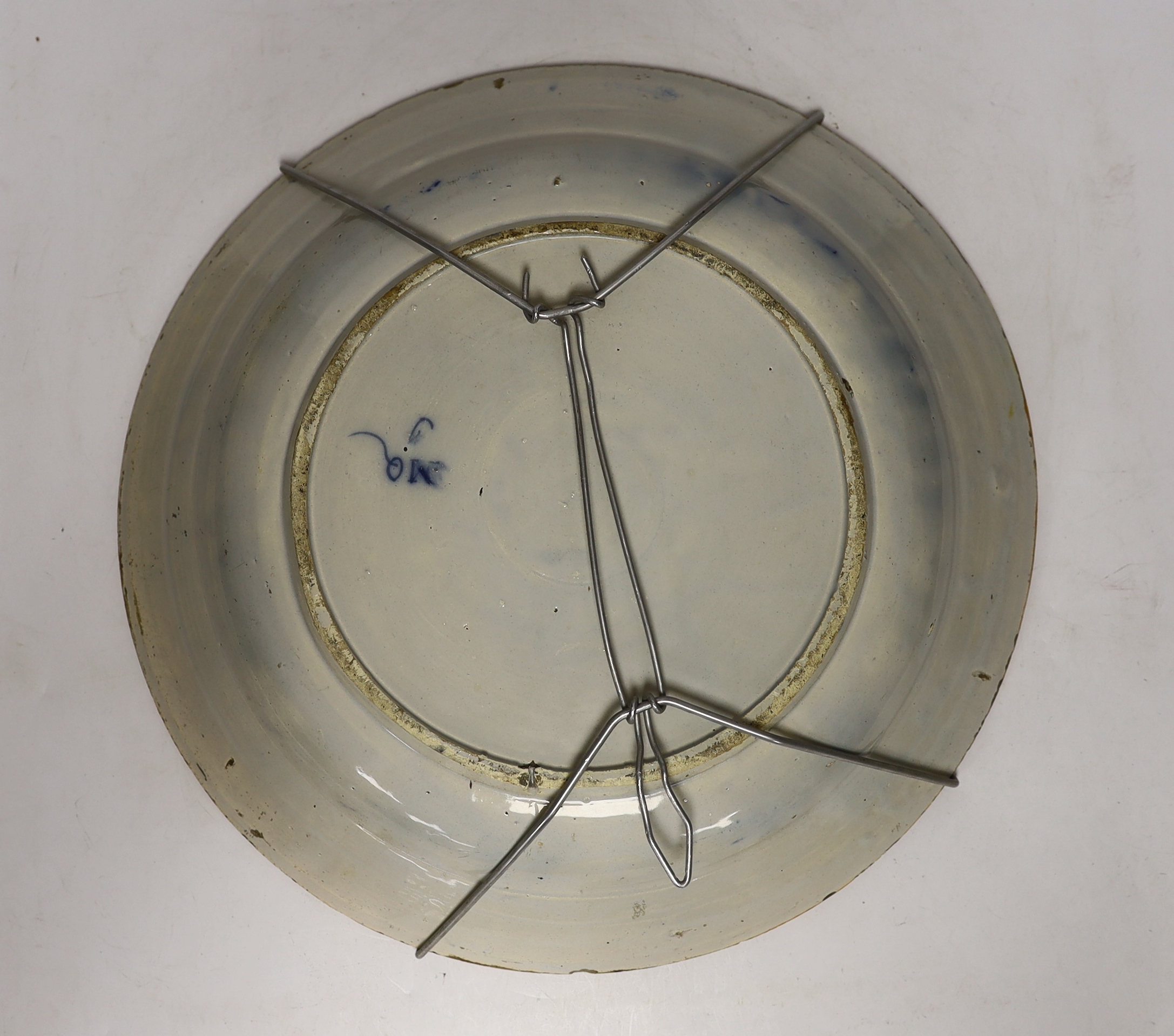 A late 18th century Delft blue and white ‘peacock’ dish, 36cm diameter